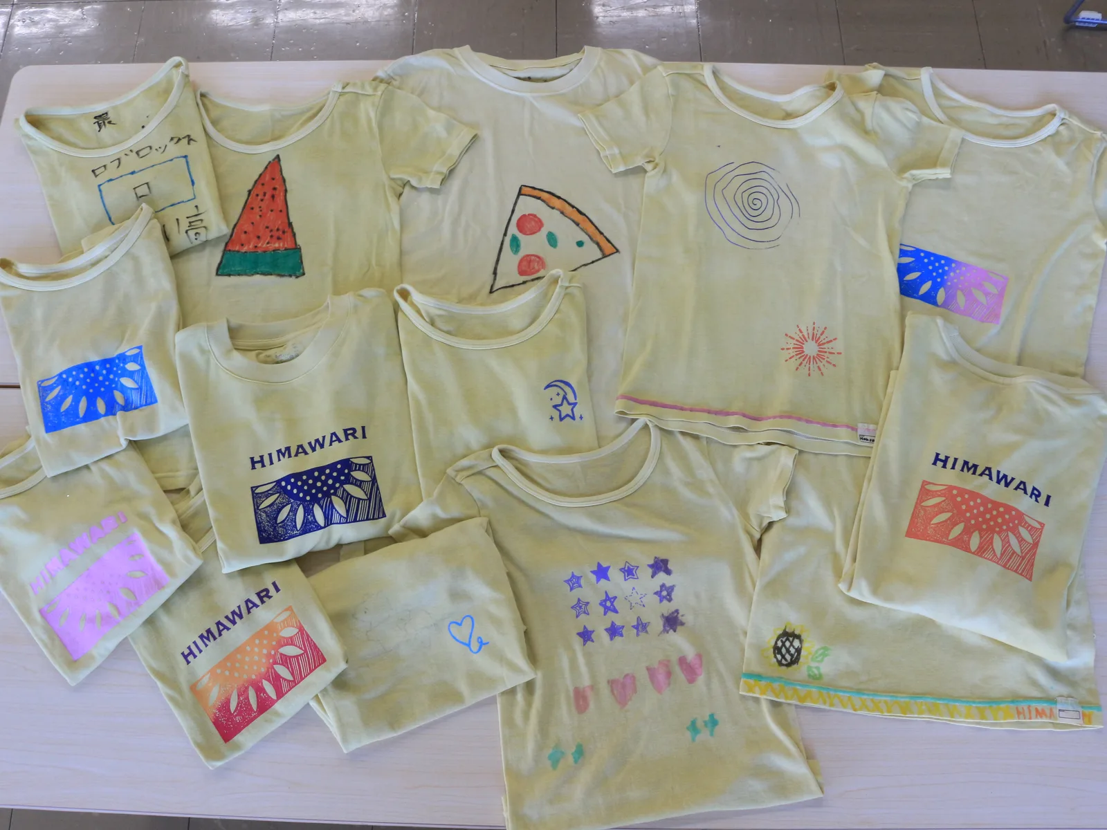 T-shirt (dyed with sunflowers, then printed with silkscreen and fabric pens)